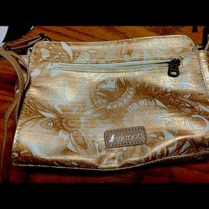 Sakroots rose gold bag with wallet